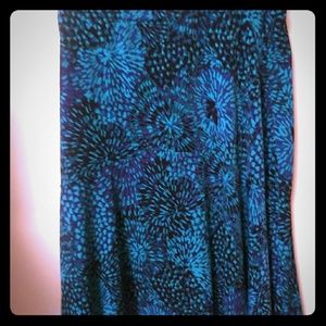 Turquoise print knee length skirt. Large 12-14